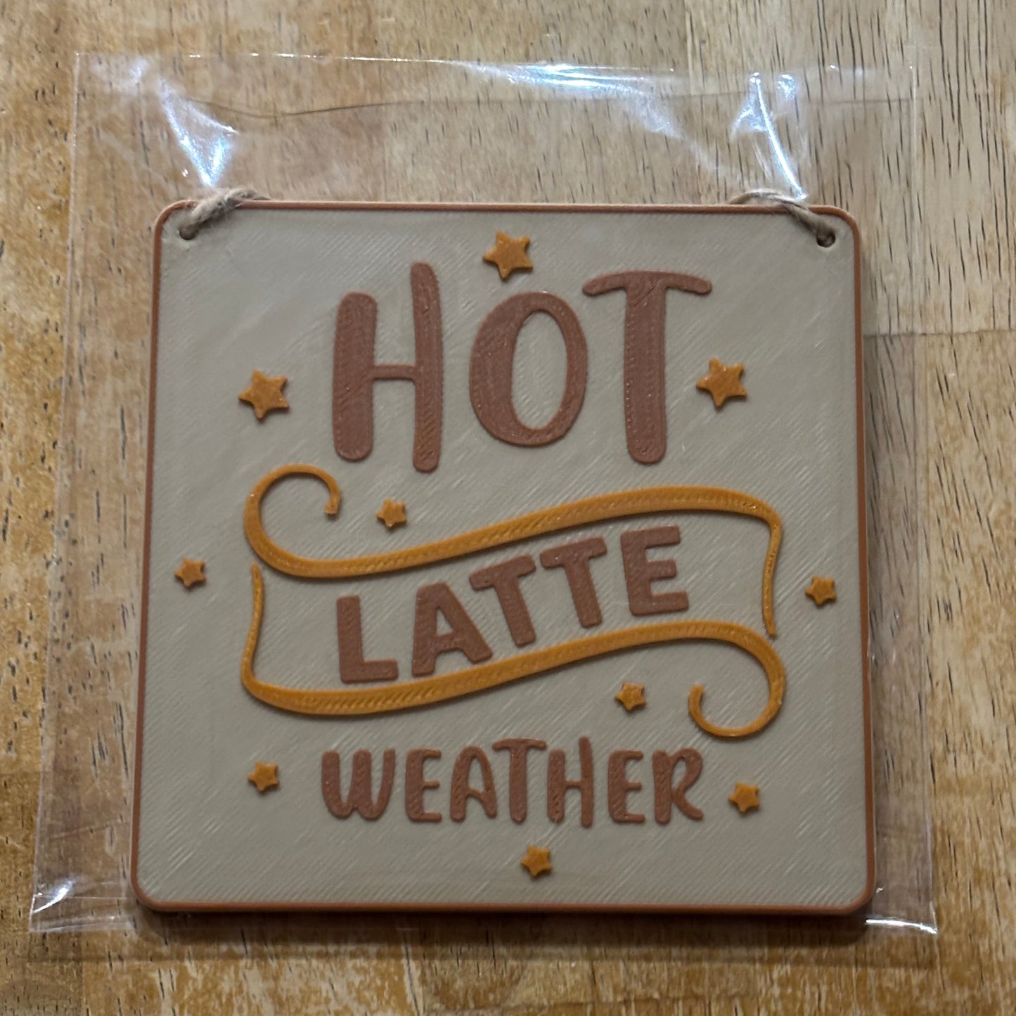 Hot Latte Weather Decorative Wall Hanging Front View Packaged