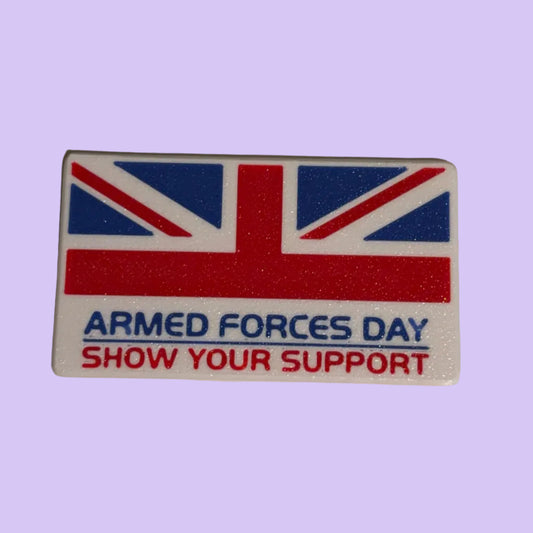 Rectangular patch with Union Jack design and text 'Armed Forces Day Show Your Support' on a beige background