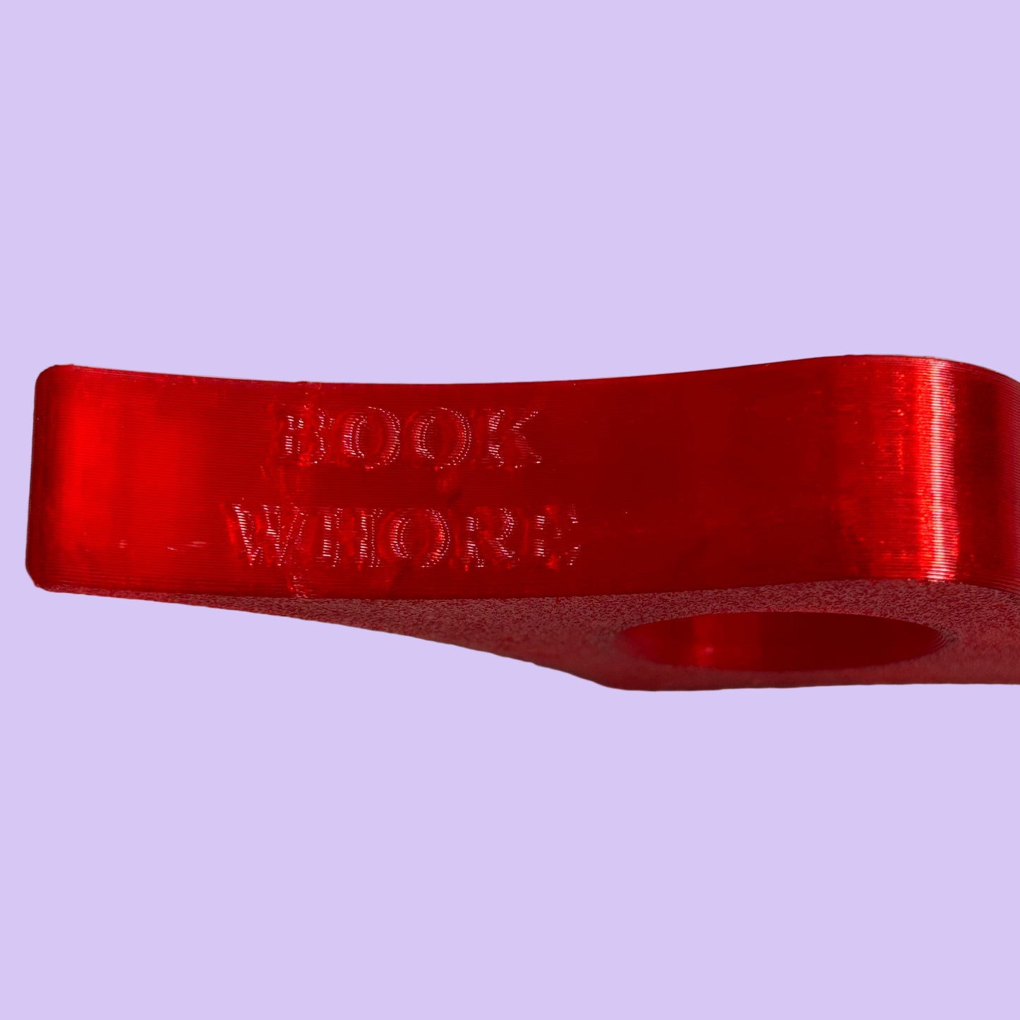 Book Whore Book Page Spreader - Thumb Holder - Transparent Red - Book Whore Close Up