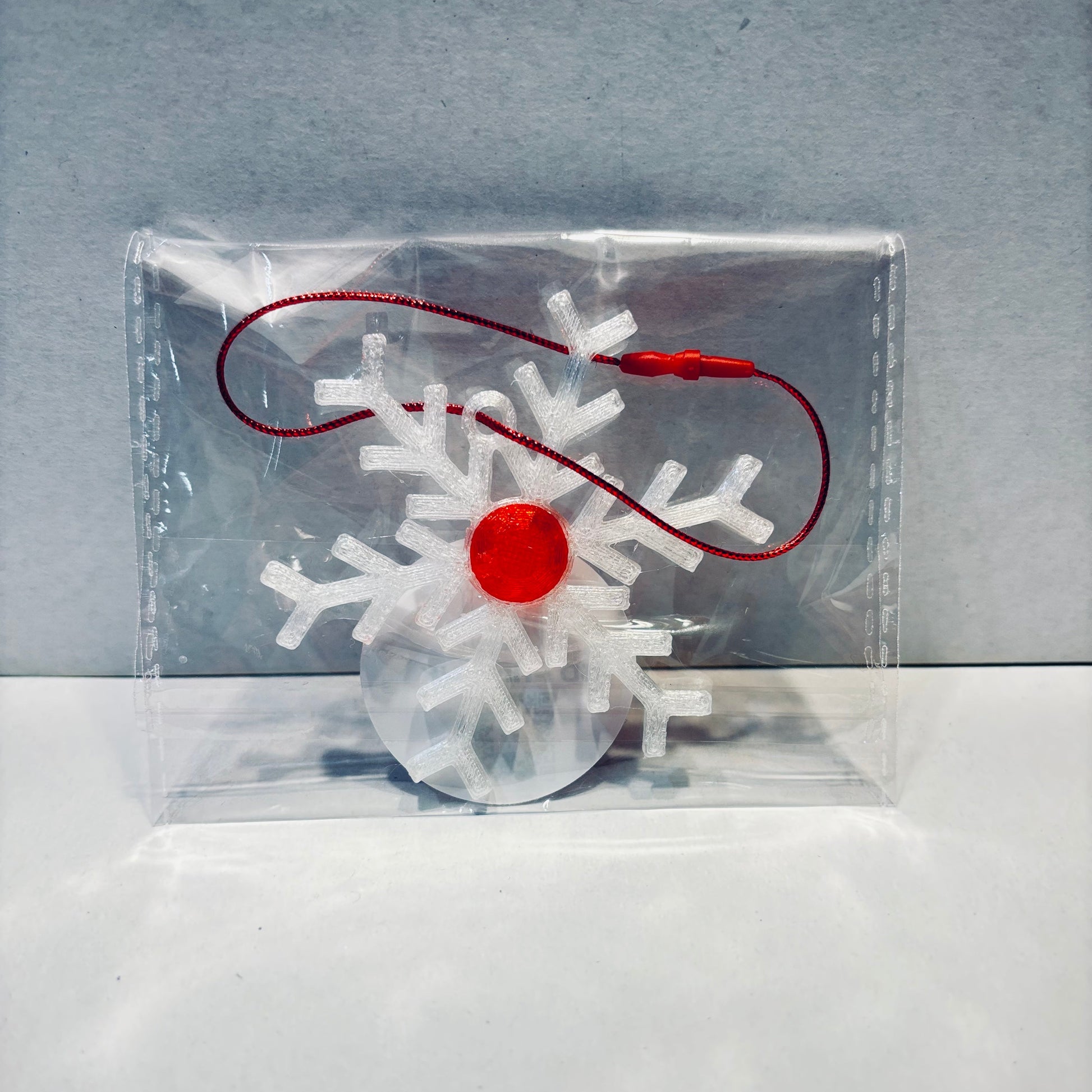 Christmas - Snowflake Gemstone Hanging Decoration - Transparent Red - Front View Packaged