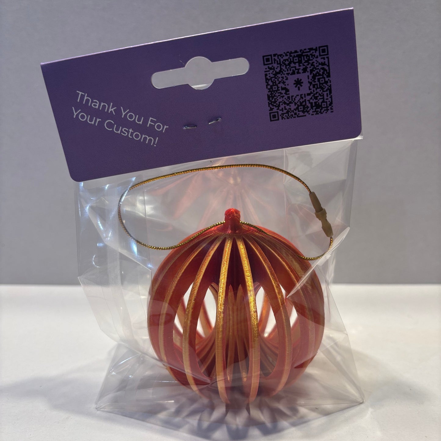 Christmas - Spinning Fidget Bauble - Red Gold Silk - Rear View Packaged