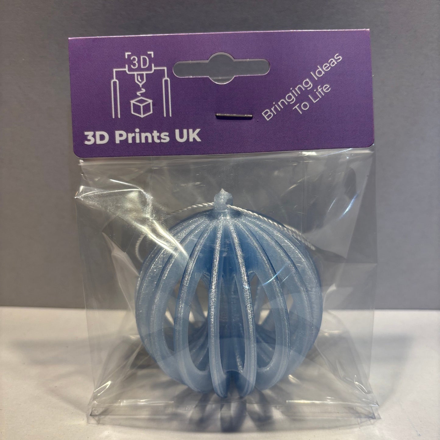 Christmas - Spinning Fidget Bauble - Transparent Light Blue - Front View Packaged