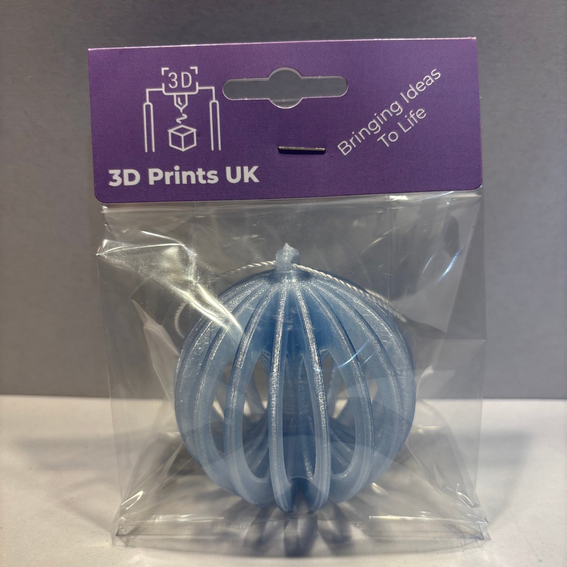 Christmas - Spinning Fidget Bauble - Transparent Light Blue - Front View Packaged