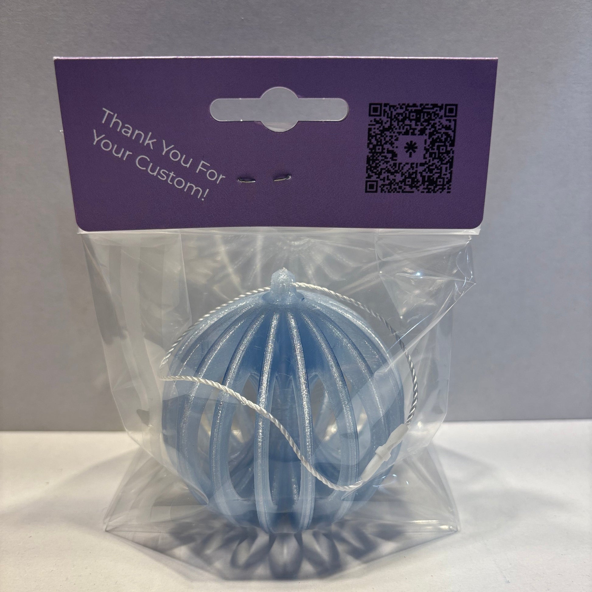 Christmas - Spinning Fidget Bauble - Transparent Light Blue - Rear View Packaged