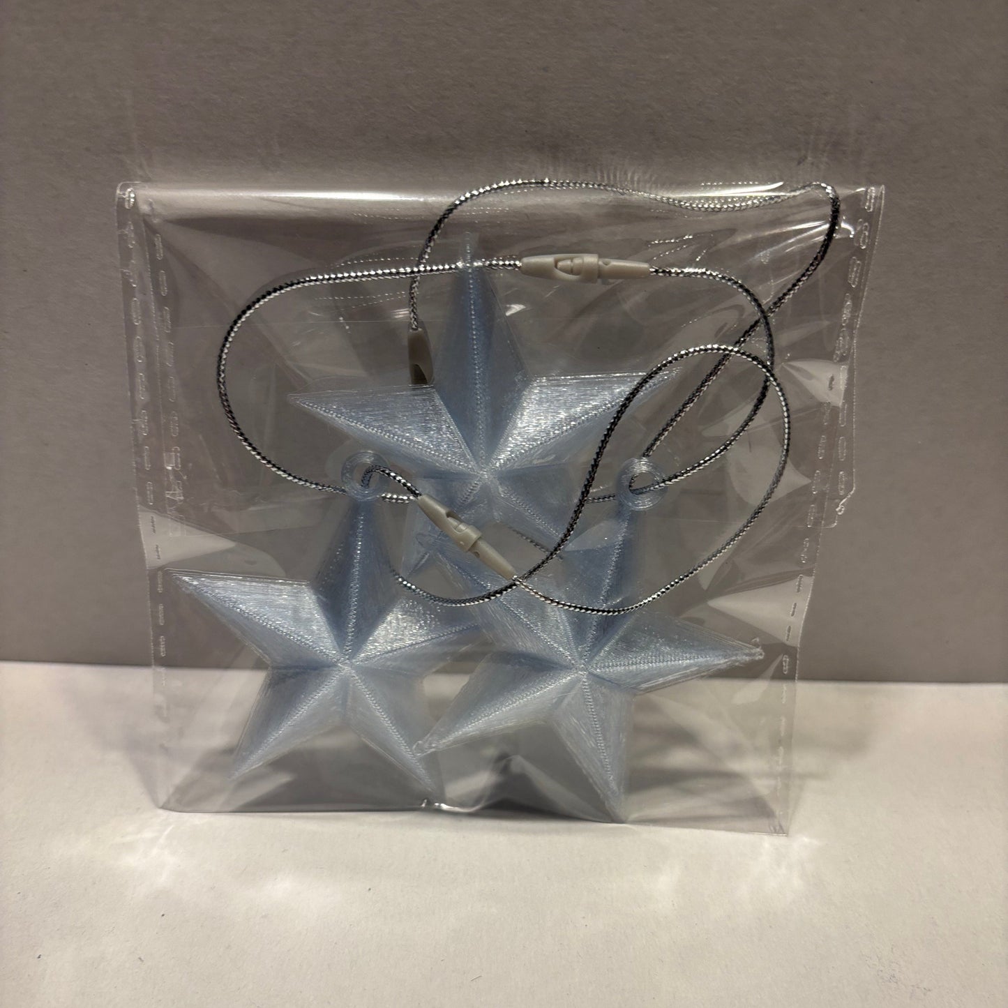Christmas - Star Hanging Decoration - Transparent Light Blue - Front View Packaged