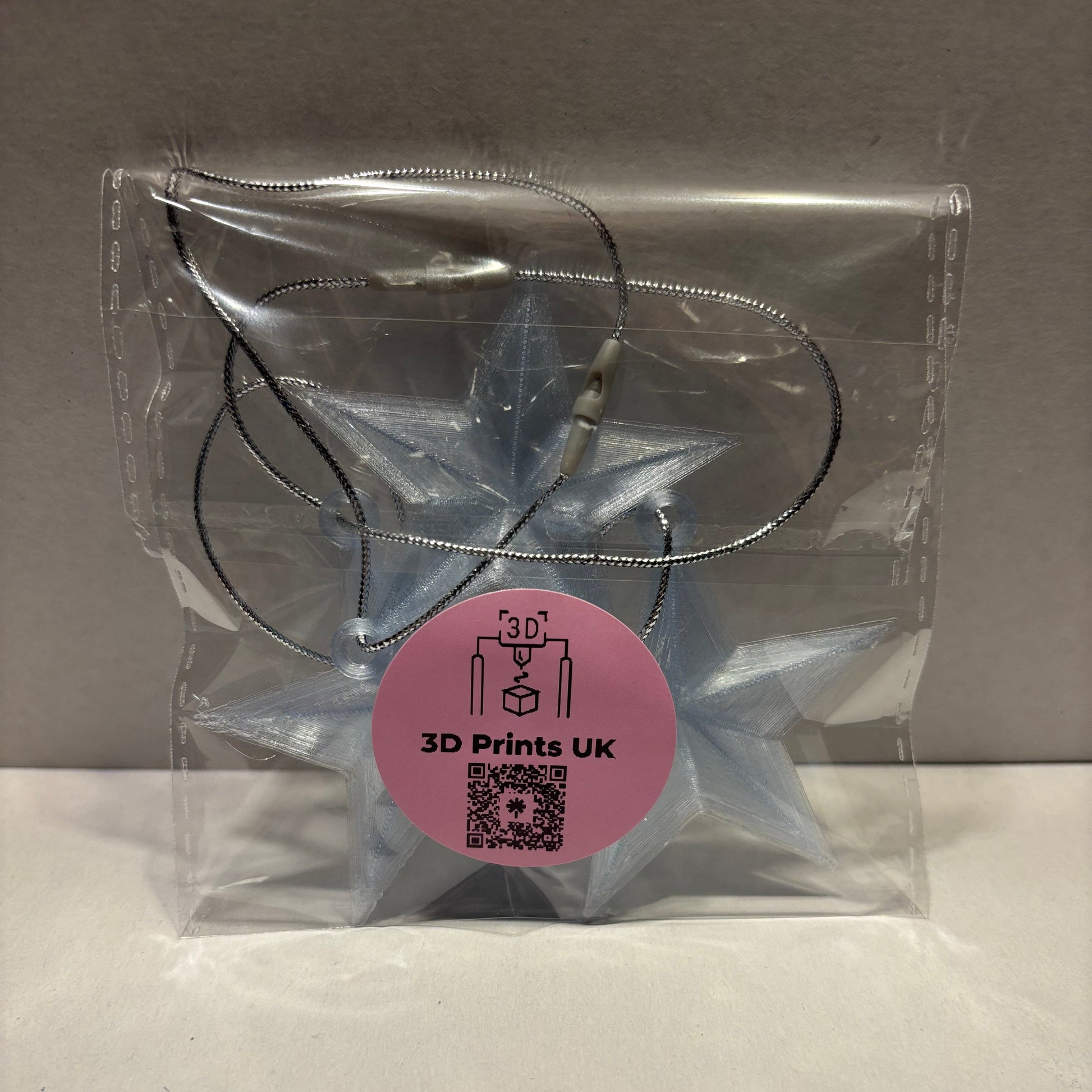 Christmas - Star Hanging Decoration - Transparent Light Blue - Rear View Packaged