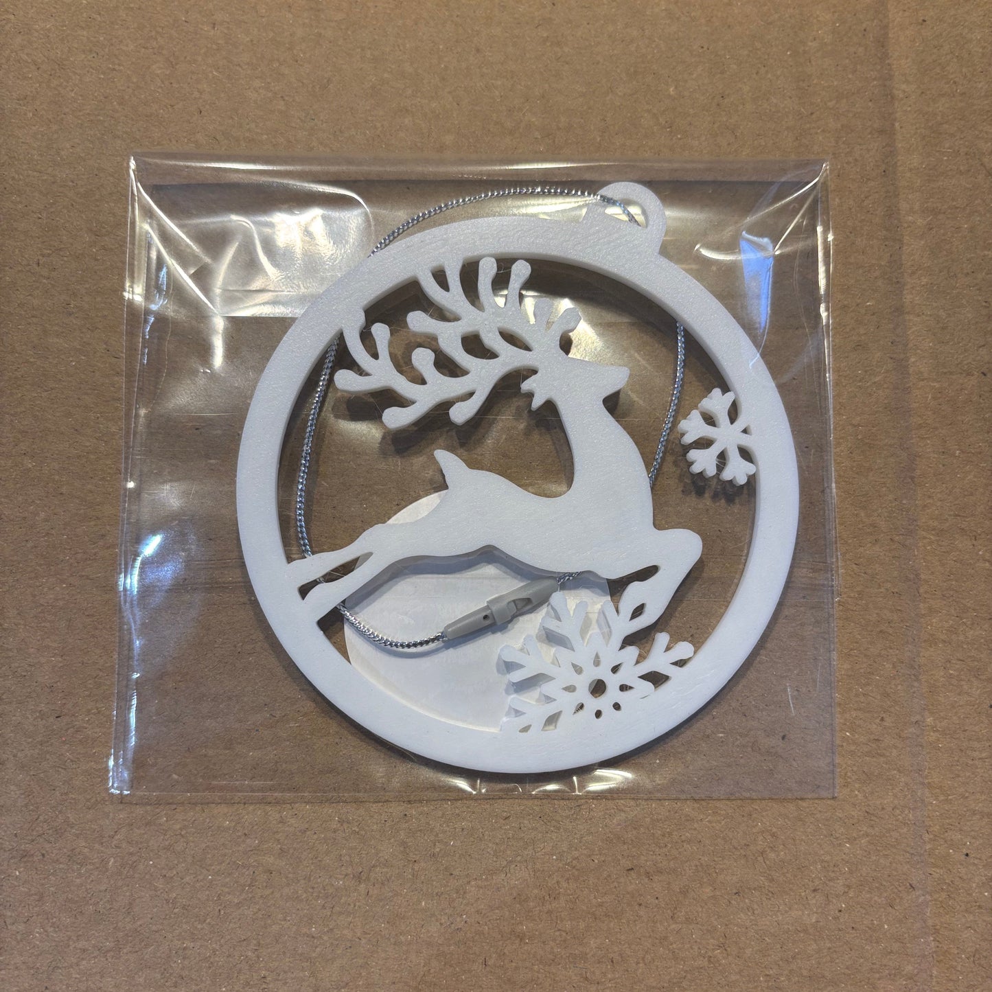 Jumping Reindeer Hanging Ornament - White PLA - Front View Packaged