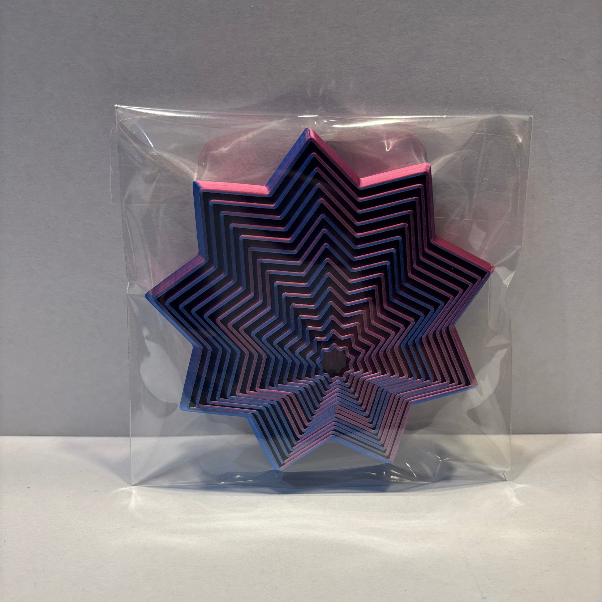 Living Aid - Sensory Star Super Fidget Flat 100mm - Red Blue - Front View Packaged