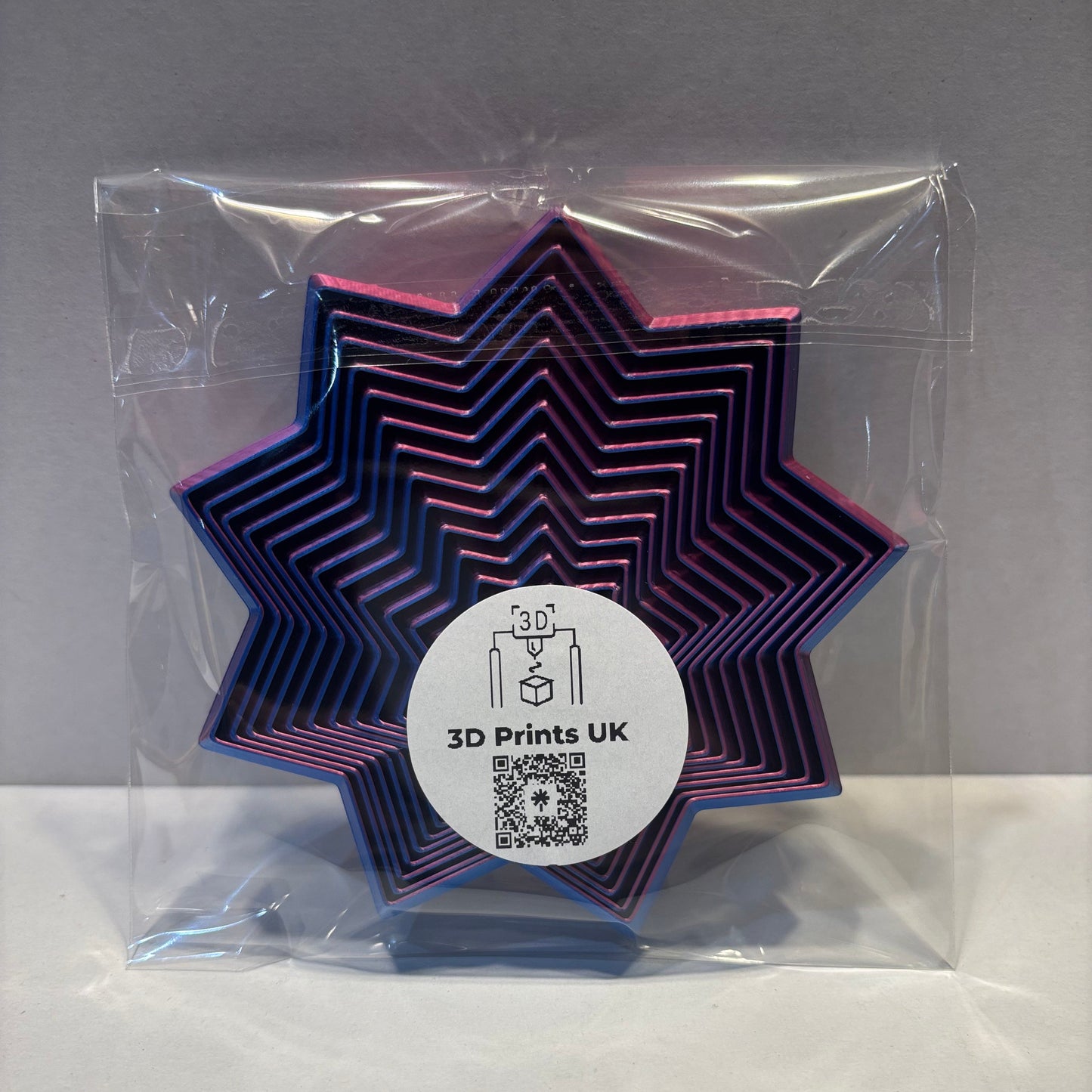 Living Aid - Sensory Star Super Fidget Flat 100mm - Red Blue - Rear View Packaged