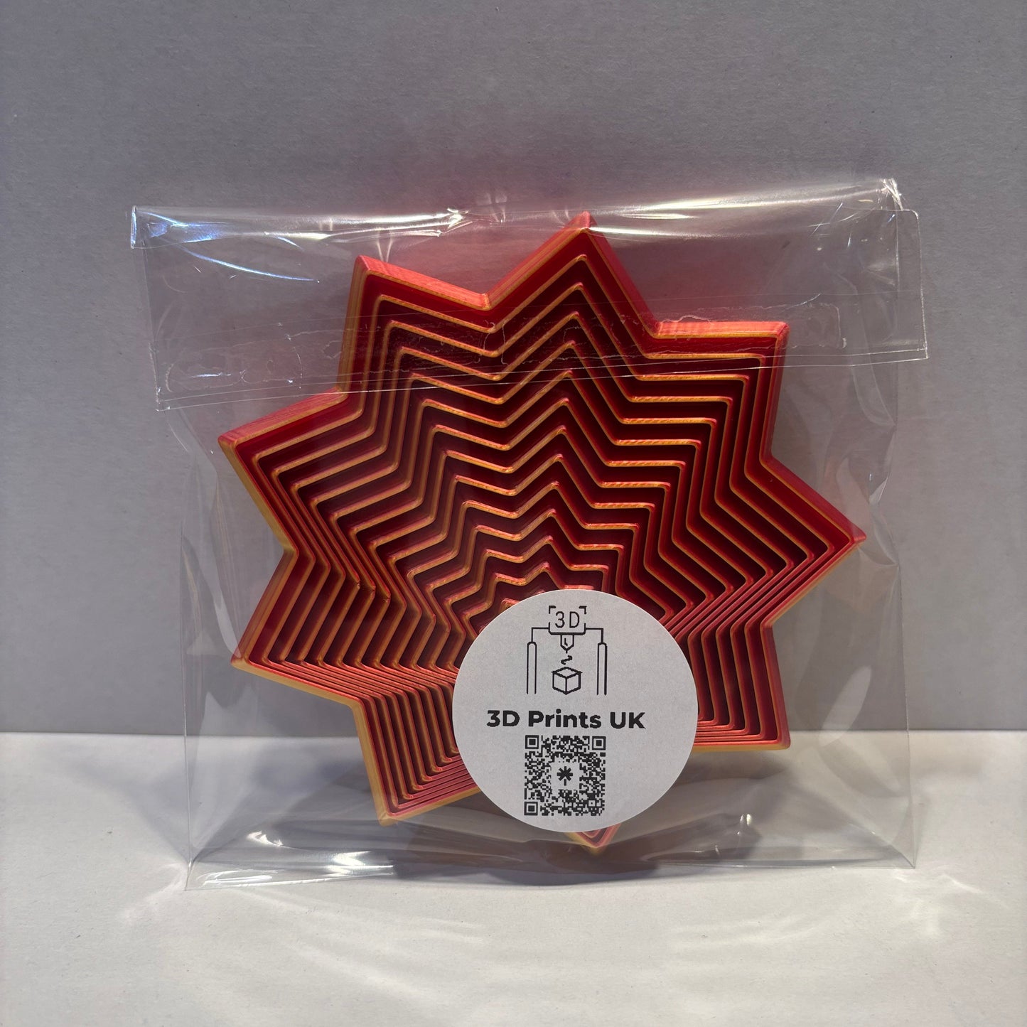 Living Aid - Sensory Star Super Fidget Flat 100mm - Red Gold - Base View Packaged