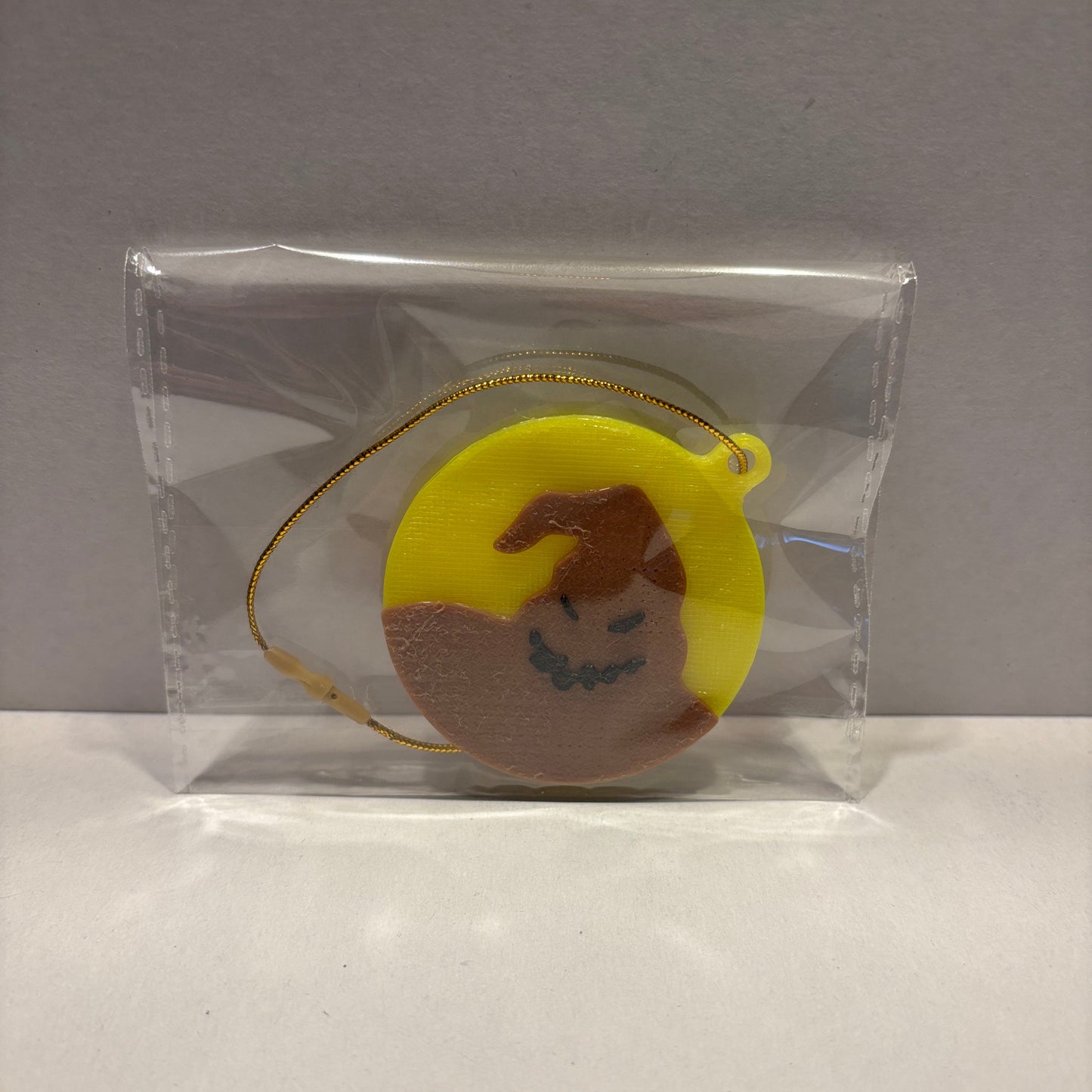 NBC - Oogie Boogie Hanging Decoration - Yellow - Front View Packaged